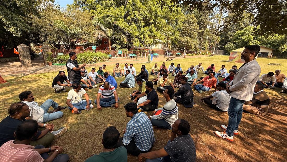 Pankkaj leading an outdoor session under the trees