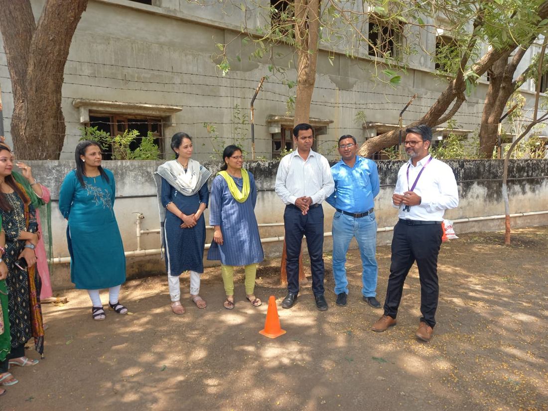 Pankkaj running an outdoor team activity